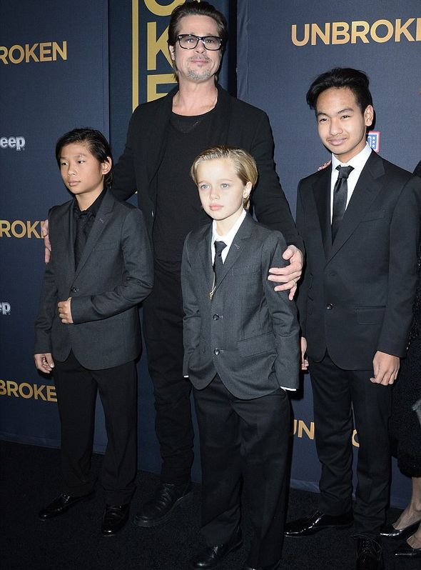 Брэд Питт с сыновьями и дочкой Шило